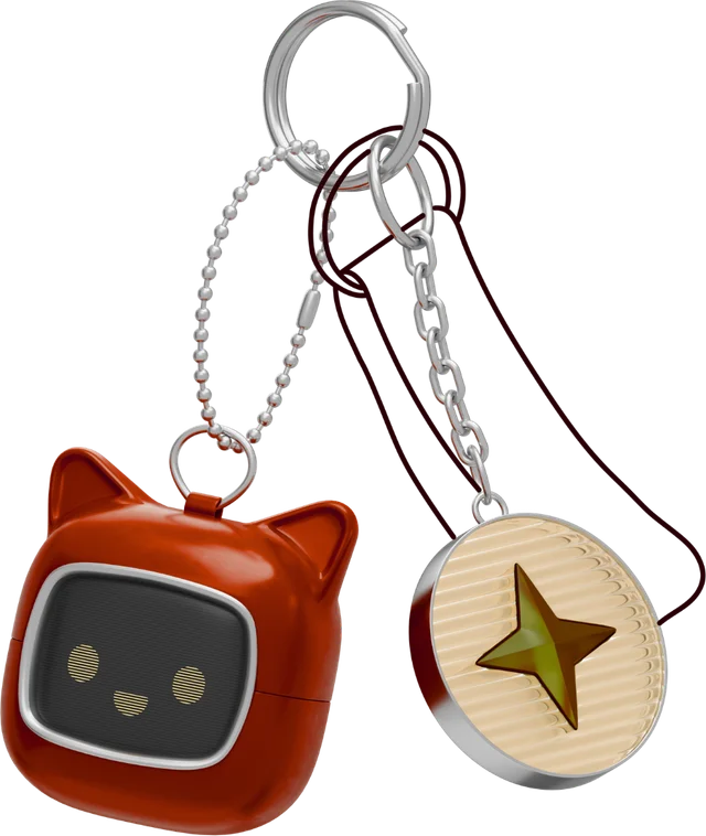Málaga Makers keyrings: a cat-eared robot and a wooden medallion with a star